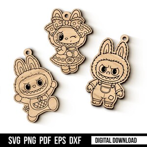 May include: Three wooden bunny-themed cutouts with a cartoonish design. One winks and wears a bow, another is in overalls, and the third is in a bunny suit. The text "SVG PNG PDF EPS DXF DIGITAL DOWNLOAD" is at the bottom.