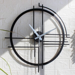 Reloj de pared moderno geométrico de metal, arte de pared minimalista en acero negro, reloj de cuarzo silencioso de gran tamaño, decoración contemporánea para el hogar, regalo hecho a mano con corte láser