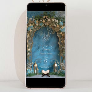 May include: A digital invitation for Ahmed's Ameen Ceremony on 15 April 2023. The invitation features a blue background with a gold archway decorated with flowers. The text "You are invited to join Ahmed's Ameen Ceremony" is written in white.