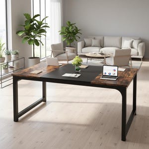 May include: A large, rectangular desk with a black metal frame and a two-tone tabletop. The tabletop features a dark, matte black center section and wood-look end sections. A laptop displays a pie chart. The desk is in a modern living space.