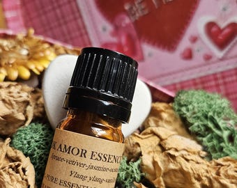 ADK Essence of Amor Essential Oil Blend. Spruce, vetiver, geranium, ylang ylang,  davana, jasmine,  ocotea, vanilla. 5 ML