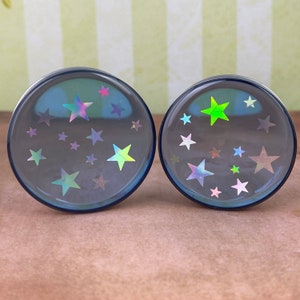 Pair of Blue Resin with Holographic Stars Plugs (EMB-013) 5/8", 3/4", 7/8", 1", 16mm, 19mm, 22mm, 25mm, 28mm, 32mm, 35mm, 38mm, 42mm, 45mm