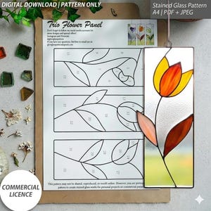 May include: A digital download pattern for a stained glass trio flower panel. The pattern includes a detailed design with numbered sections and a finished example of a tulip in yellow, orange, and brown. Includes a commercial license.