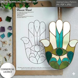 May include: A stained glass Hamsa Hand pattern in shades of green, teal, and cream, with a gold-colored metal frame. The pattern is displayed next to a printed pattern sheet. Text includes "DIGITAL DOWNLOAD | PATTERN ONLY" and "COMMERCIAL LICENCE."
