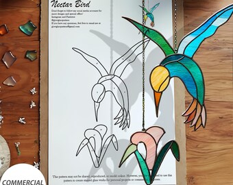 May include: A stained glass pattern for a hummingbird with a flower. The pattern is printed on white paper with numbered sections for each colour of glass. The pattern is labelled "Nectar Bird" and includes instructions for commercial use.