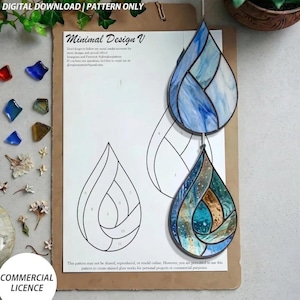 May include: A digital download pattern for a stained glass suncatcher featuring two teardrop shapes. The pattern includes line drawings and text labeled Minimal Design V, alongside two finished glass pieces in blue and earth tones.