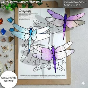 May include: Stained glass dragonfly pattern with a commercial license. The image shows three dragonfly designs in shades of blue and purple, hanging in front of a pattern sheet. The text "DIGITAL DOWNLOAD | PATTERN ONLY" is at the top.
