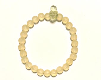 Pulseira de miçangas inspirada no Mickey - Creme com miçangas facetadas