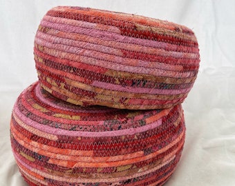 Two Matching Handmade Fabric Baskets in Pinks, Corals, and Reds