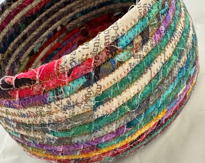 Tim Holtz Fabrics in Newsprint, Red, Blue, Green, Purple and Gold as Clotgeslibe Basket
