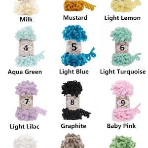 May include: A collection of twelve skeins of Alize brand loop yarn in various colors. Colors include milk, mustard, light lemon, aqua green, light blue, light turquoise, light lilac, graphite, baby pink, white, grey beige, and pastel green.