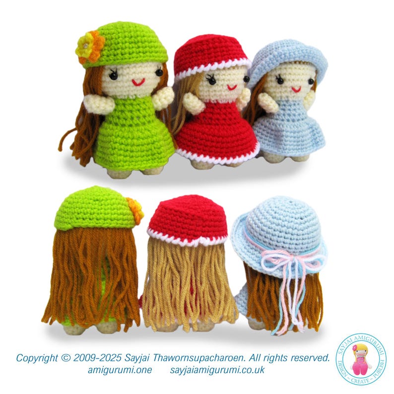 May include: Three crocheted dolls with different colored dresses and hats. The dolls have brown yarn hair and are standing on a white background.