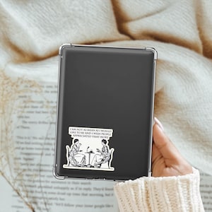 May include: A black and white sticker with a quote that reads "I am not as mean as I would like to be and I wish people appreciated that more". The quote is accompanied by a black and white illustration of two women sitting at a table with teacups.