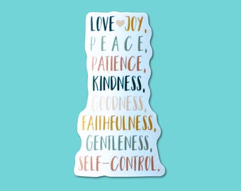 May include: A white sticker with the words "LOVE JOY, PEACE, PATIENCE, KINDNESS, GOODNESS, FAITHFULNESS, GENTLENESS, SELF-CONTROL" in various colors. The sticker has a light blue background.