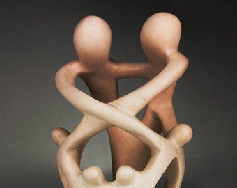 Sculpture vintage en pierre ollaire : une famille de six personnes