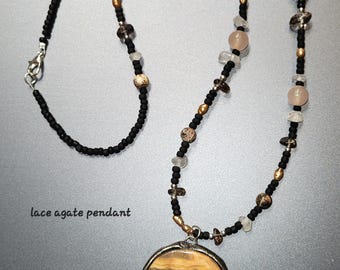 handmade 25" beaded necklace with large crazy lace agate pendant set in gunmetal solder