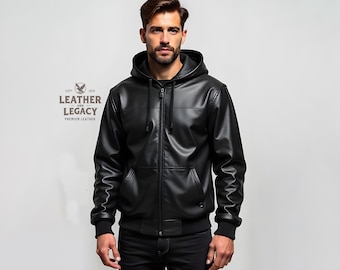 May include: A black leather hooded jacket with a zipper closure. The jacket has a logo on the left chest that reads "Leather and Legacy, Premium Leather".