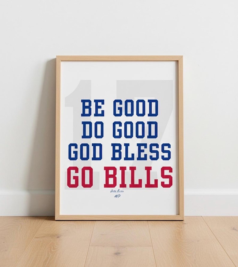 May include: Framed print with the text "BE GOOD DO GOOD GOD BLESS GO BILLS" in blue and red, with the number 17 in the background. The print is in a light wood frame.