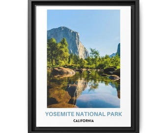 May include: A framed wall art print featuring a landscape of Yosemite National Park in California. The image shows a large granite mountain peak rising above a calm river with green trees and rocks, with the text YOSEMITE NATIONAL PARK CALIFORNIA.