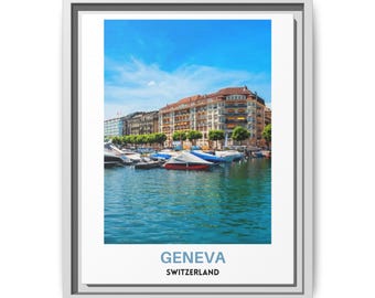 May include: A framed wall art print featuring a vibrant photograph of Geneva, Switzerland, showing a blue lake with docked boats in the foreground and multi-story buildings under a clear sky. The text GENEVA SWITZERLAND is printed at the bottom.