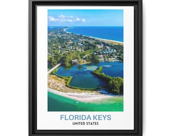 May include: A framed wall art print featuring an aerial view of the Florida Keys coastline with turquoise waters, sandy beaches, and lush green vegetation. The text FLORIDA KEYS is printed in light blue, with UNITED STATES in black below it.