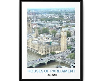 May include: A framed wall art print featuring an aerial view of the Houses of Parliament and Big Ben in London. The image shows the historic stone buildings, the River Thames, and Westminster Bridge. The text HOUSES OF PARLIAMENT LONDON is printed below.