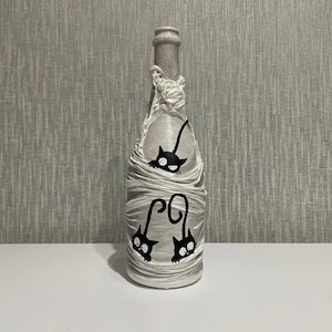Wine bottle decorations. Handcrafted Glass Bottle with Playful Cat Design