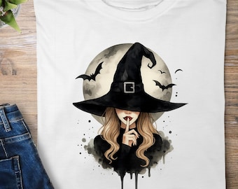 May include: White t-shirt with a watercolour illustration of a woman in a black witch hat, bats, and a full moon. The woman has her finger on her lips, a gesture for silence. A Halloween-themed design.