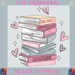 May include: A stack of pink and blue books with titles like "Soul Mates", "Forbidden Love", "Fated Mates", "Age Gap", "Love Triangle", and "Slow Burn: Marriage of Convenience". The books are surrounded by pink hearts and stars. The text "DTF Transfer" and "Ready to Press" is at the top and bottom of the image.