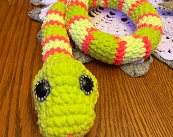 Slithery Snake pattern by Premier Yarns. Finished product. Yarn glows in black light!