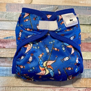 Pinwheels PUL cloth diaper cover with snaps or hook and loop. XS/Newborn, Small, Medium, Large, or One Size