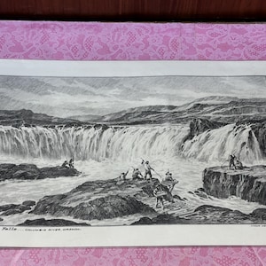 May include: Black and white print of Celilo Falls on the Columbia River, Oregon. The artwork depicts a waterfall cascading over rocks, with figures on the rocks and in a boat. The print has the text "Celilo Falls...Columbia River, Oregon."