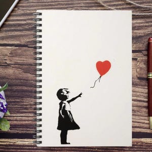 May include: A black and white illustration of a girl reaching for a red heart-shaped balloon on a white background.