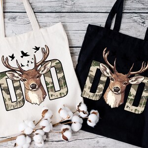 two totes bags with deer heads on them