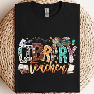 a black t - shirt with the words library teacher printed on it