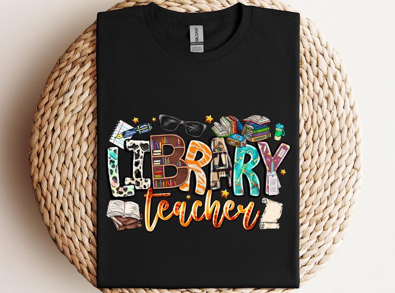 a black t - shirt with the words library teacher printed on it