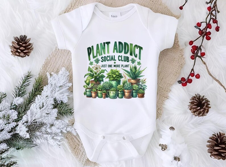 a baby bodysuit with plants on it