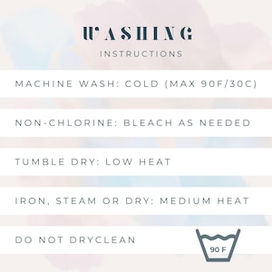 May include: White background with watercolor washes and text. The text reads "WASHING INSTRUCTIONS" followed by care instructions: machine wash cold (max 90F), non-chlorine bleach as needed, tumble dry low heat, iron medium heat, do not dry clean.