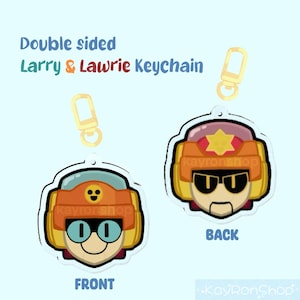 May include: Double-sided Larry & Lawrie keychain. The front side features a character with glasses and a helmet, while the back side shows the same character with sunglasses. The keychain has a gold-colored clasp. Text on the image reads "Double sided Larry & Lawrie Keychain".