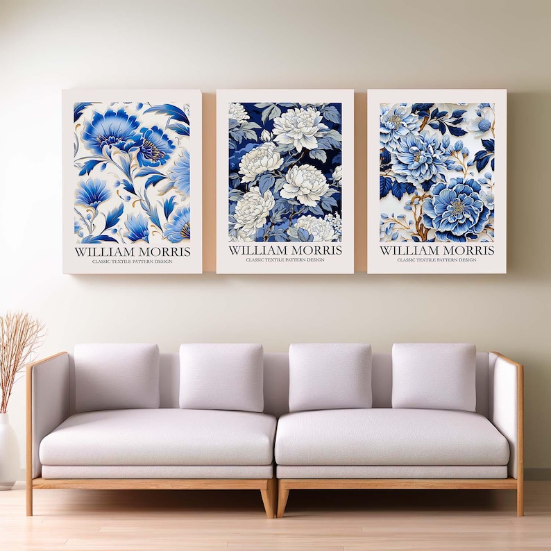 May include: Three framed prints with blue and white floral patterns. Each print features the text "WILLIAM MORRIS" and "CLASSIC TEXTILE PATTERN DESIGN".