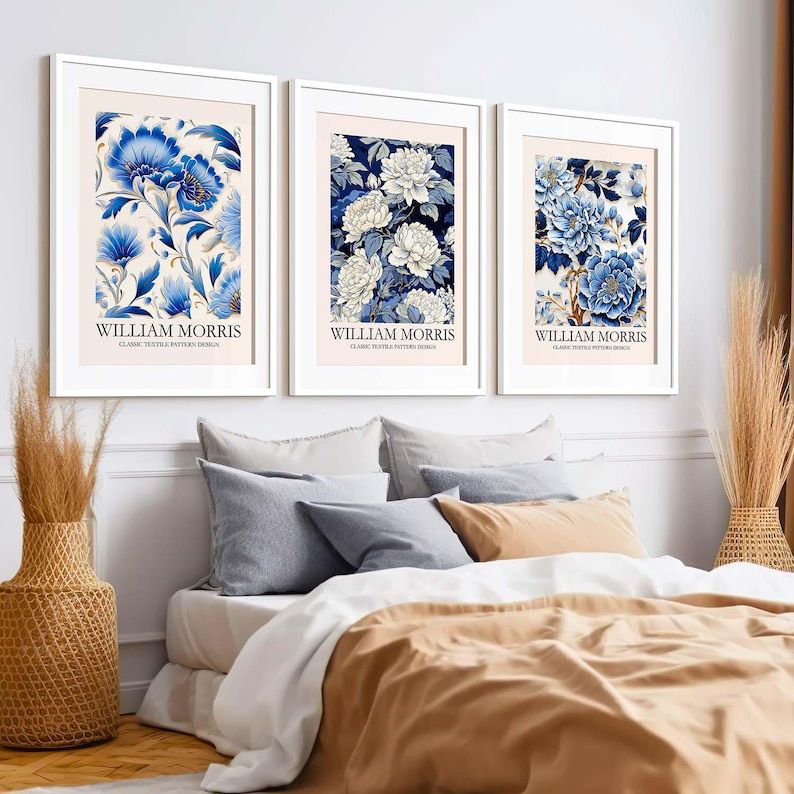 May include: Three framed prints with floral designs in shades of blue and white. Each print features the text "William Morris" and "Classic Textile Pattern Design".