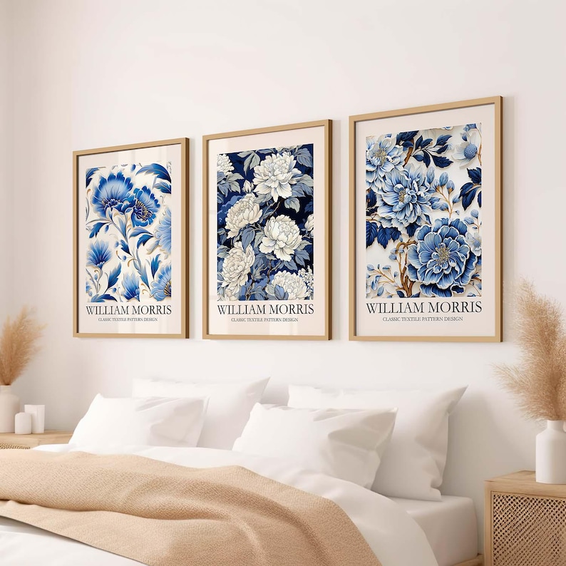 May include: Three framed prints featuring blue and white floral patterns. Each print has the text "William Morris" and "Classic Textile Pattern Design" below the image.