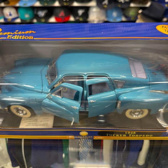 1/18 1948 Tucker Torpedo Studebaker Metallic Blue American Mint
