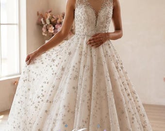Celestial Glow – Star Embroidered Wedding Dress | Sparkly A-Line Bridal Gown with Glitter Tulle, V-Neck, and Flowing Train