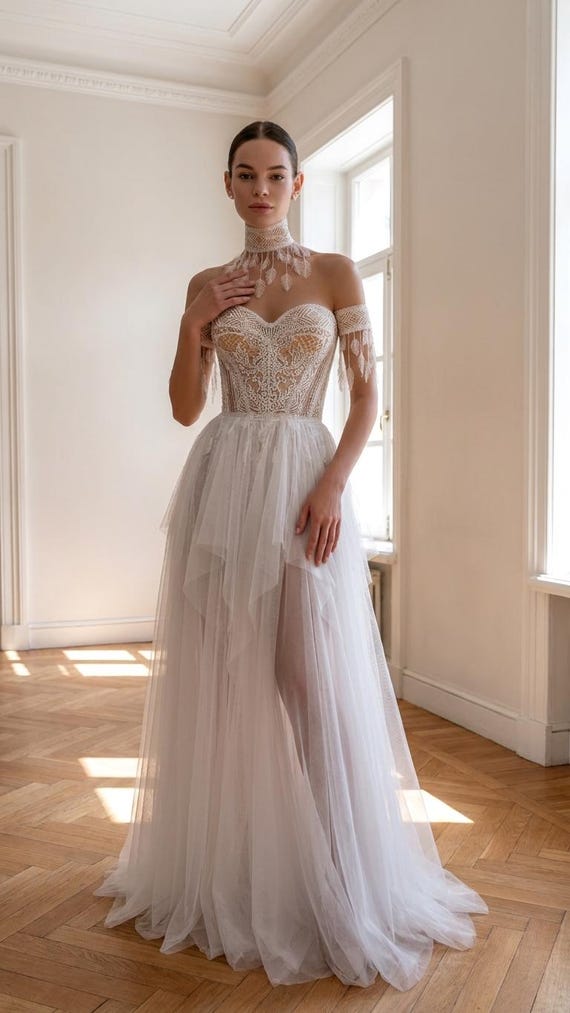 Romantic Lace Corset Wedding Dress - Sheer Tulle A-Line Gown with Sweetheart Neckline, Off-Shoulder Sleeves, and High Neck Collar Boho Style Romantic Lace Corset Wedding Dress - Sheer Tulle A-Line Gown with Sweetheart Neckline, Off-Shoulder Sleeves, and High Neck Collar Boho Style