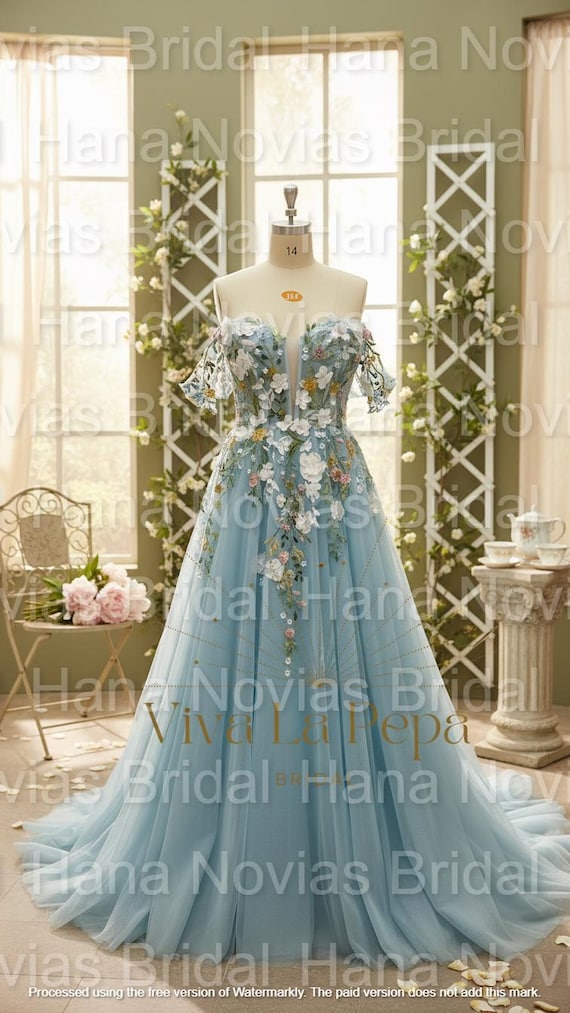 celestial embroidered dress   :  . A vision suspended between  earth and sky, Celestial Bloom unfolds as a couture bridal masterpiece  where romance meets meticulous artistry. Designed to embody ethereal  femininity, this silhouette
