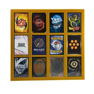 May include: A gold-colored display case holding twelve trading cards. The cards feature various designs and logos, including "Naruto," "Pokemon," and "Dragon Ball Z." The case has a rectangular shape with a gold border, showcasing the cards in a grid arrangement.