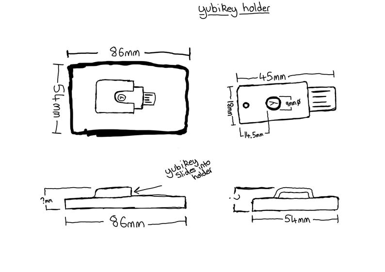 May include: A black and white technical line drawing of a Yubikey holder. The diagram displays top, side, and front views with dimensions in millimeters, including an 86mm by 54mm base and a 45mm by 18mm Yubikey with a 9mm diameter circular button.