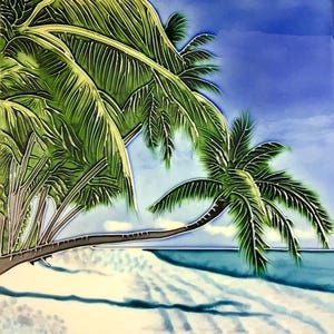 May include: A ceramic tile with a painted image of two palm trees on a white sandy beach with blue water in the background.