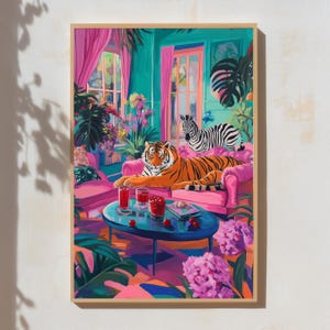 May include: A framed art print depicts a vibrant interior scene. A tiger lounges on a pink sofa, with a zebra nearby. The room features pink curtains, a blue table with drinks, and lush plants. The artwork is rich in color and detail.